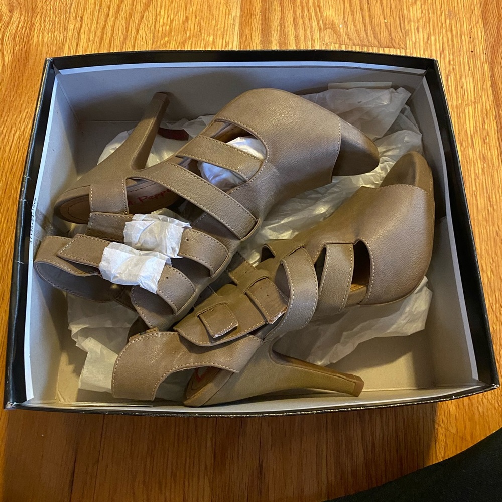 Never worn heels